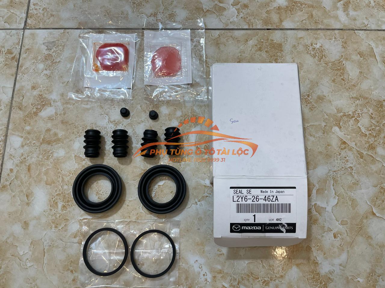 Cupen chụp bụi phanh sau Mazda CX9 2011-2017 chính hãng L2Y62646ZA