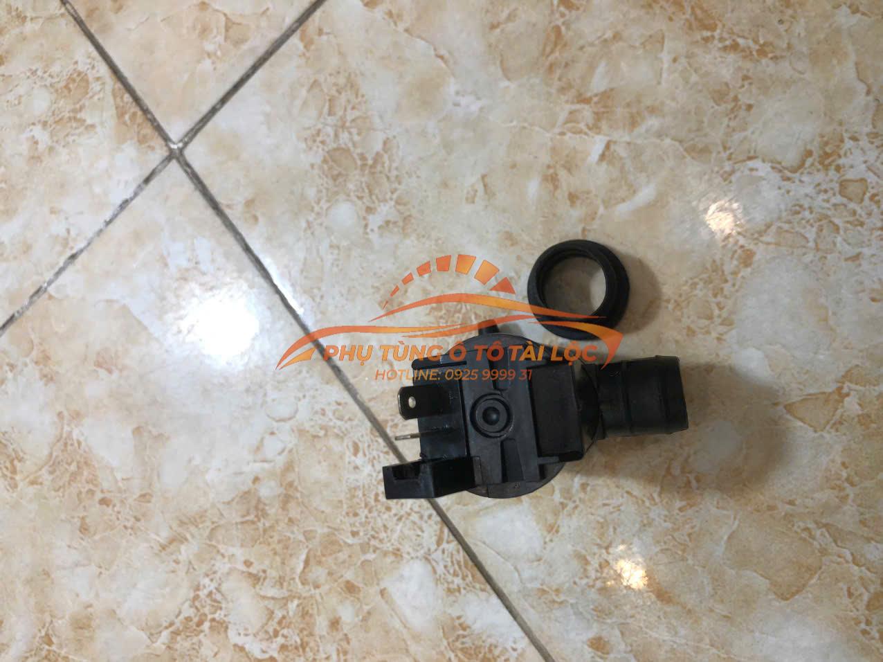Mô tơ bơm nước rửa kính Ford Laser 2001-2005 93BB17K624AA